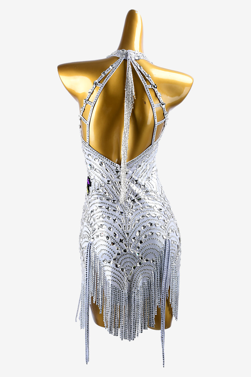 Permino silver metallic lycra Latin dress with lace appliqués, stone fringes white crystals & sew-on stones