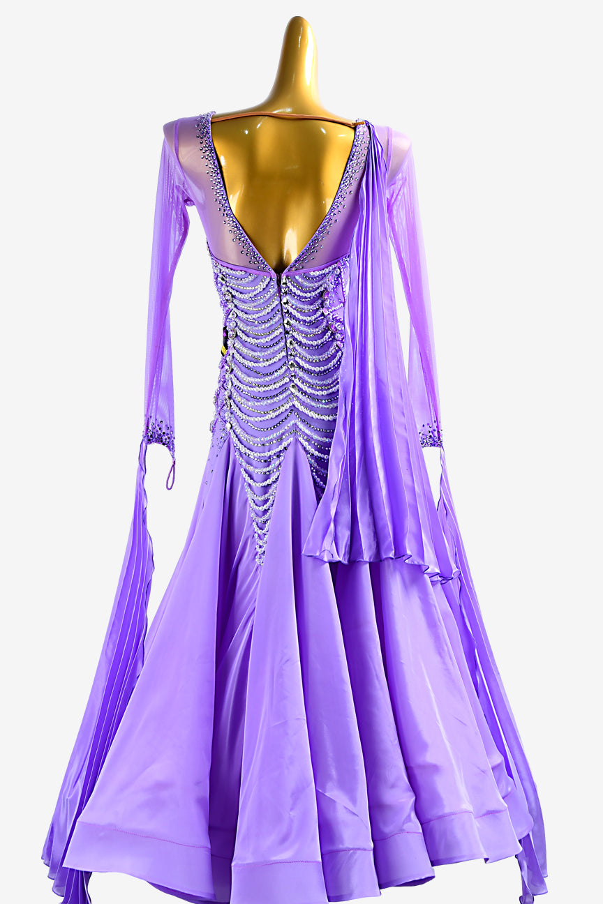 Permino lilac Standard dress with mesh sleeves, pearl chiffon underskirts, pleated float, white crystals and beadings